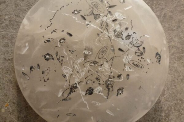 Energy I, 2009, alabaster, ink, ø 10x0,5 cm