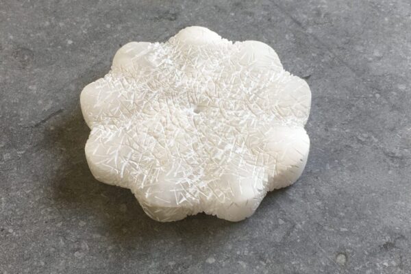 Flower of Life I, 2024, white alabaster, ø 10x2 cm